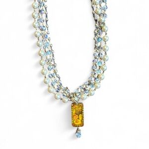 Elegant Pearl and Crystal Necklace with Gold Pendant